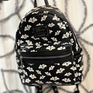 Disney Halloween Loungefly Backpack. Bats glow in the dark